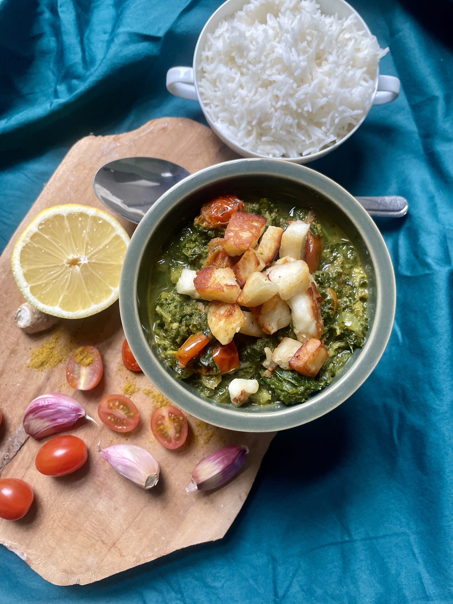 Close-up of Saag Halloumi with Kale, a comforting and flavorful dish inspired by the Indian classic Saag Paneer. The tangy and spicy flavors make it a cherished recipe, tempting enough to consider a midnight snack. A dreamy fusion of comfort and zest.