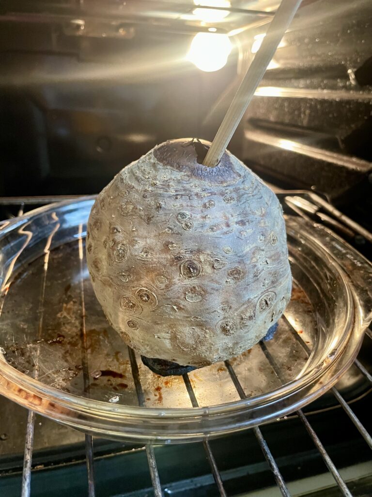 Celery Root Roasting Process - Guiding you through the oven journey: Place the celery root on a baking tray, allowing it to roast for an hour. Check for consistency – it should be sliceable like a potato. Gauge doneness by poking a knife into the white flesh. Oven times vary, so start checking around an hour to ensure it's perfectly roasted without turning mushy. Your culinary adventure awaits with this Asian Star Anise Roasted Celery Root (Vegan) recipe.