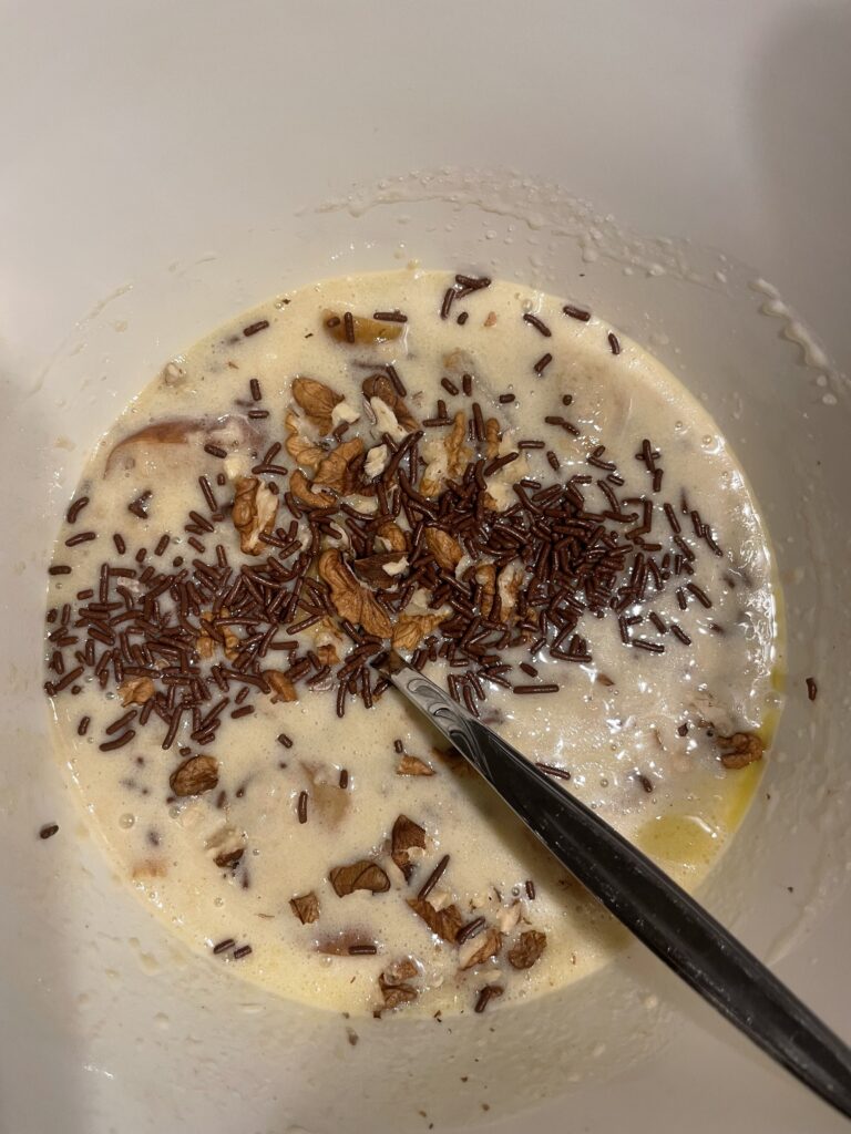 Texture Unleashed. Gently folding in crushed walnuts and unexpected chocolate sprinkles to the batter. Creating a delightful mosaic of crunch and sweetness in Sweet Walnut & Old Apple Bread.