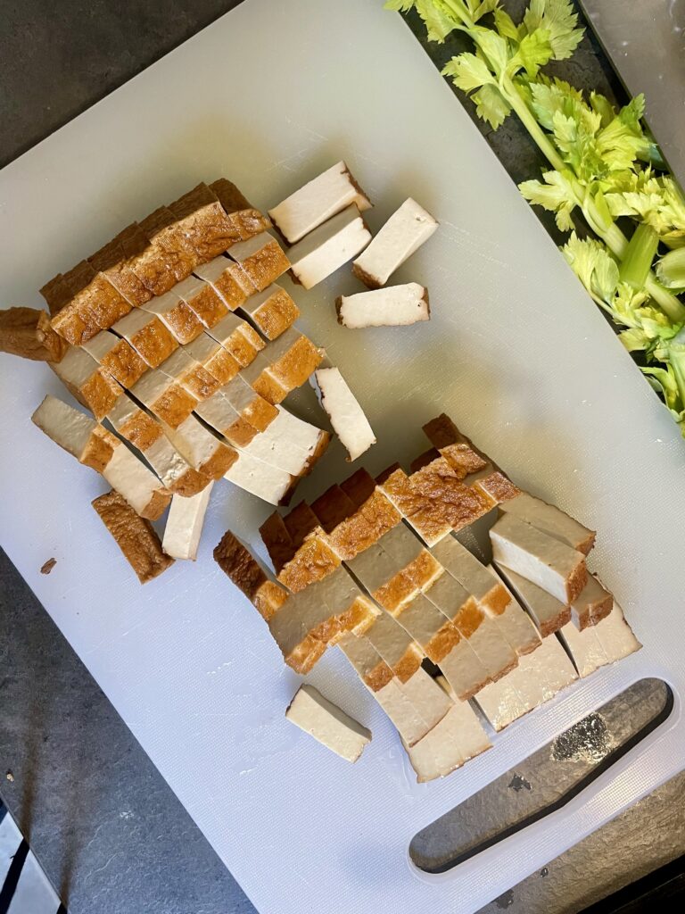 Diced Tofu Ready to Sizzle and Infuse Flavor in the Wok