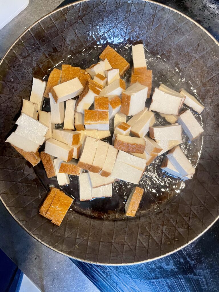 Raw Potential: Tofu Cubes Ready to Sizzle in the Skillet