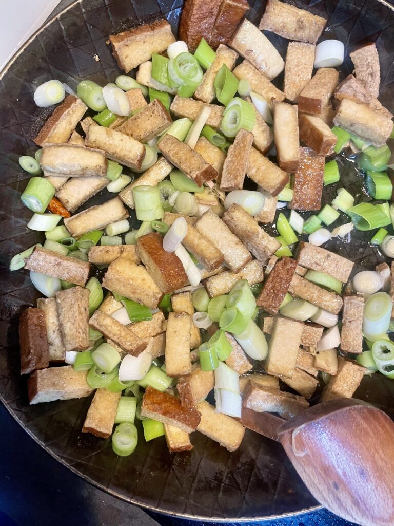 Golden Tofu Infused with Aromatic Flavors Ready for the Celery Party